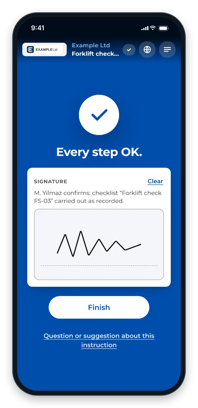 End of the forklift check on a phone: the worker confirms with name and signature